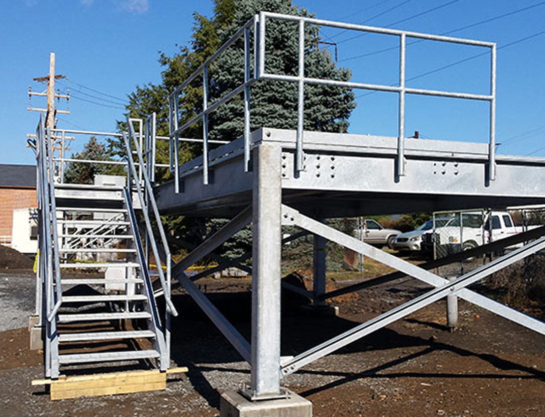 custom hot-dipped galvanized platform with bolted handrails, for water and wastewater needs