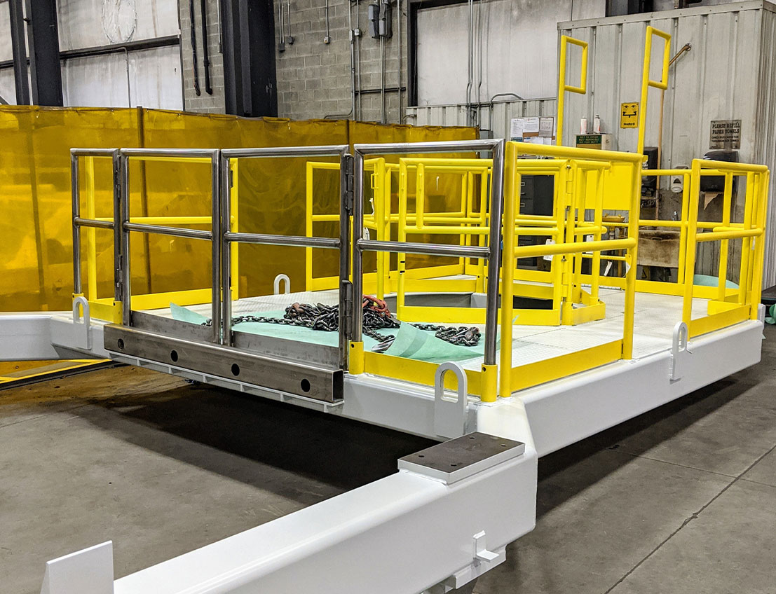 an OSHA-compliant handrail and a tubular carbon steel frame platform