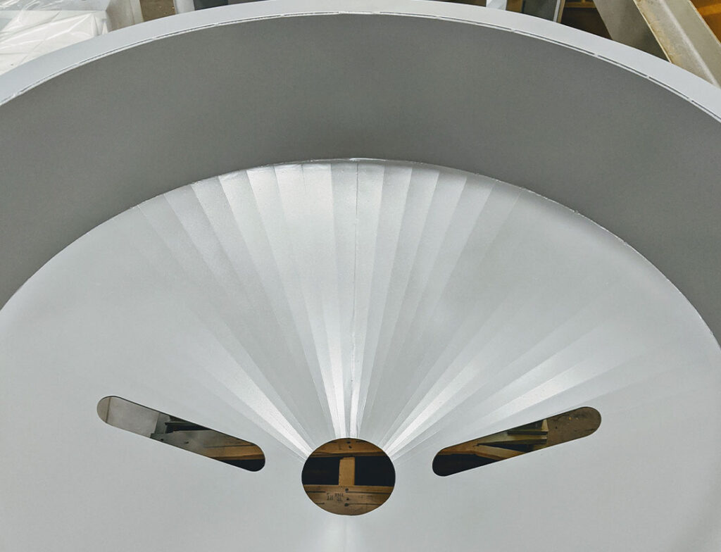 Light grey painted or glass bead finished custom chute or hopper.