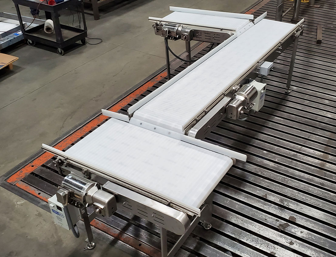 Stainless steel Conveyor shown with food safe construction in silver and white