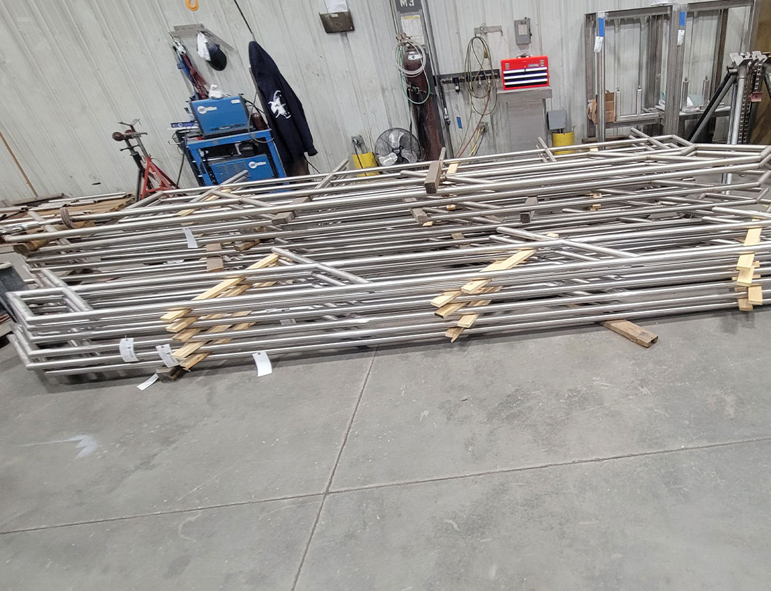 front view of several welded and stacked Stainless Steel Osha Railing