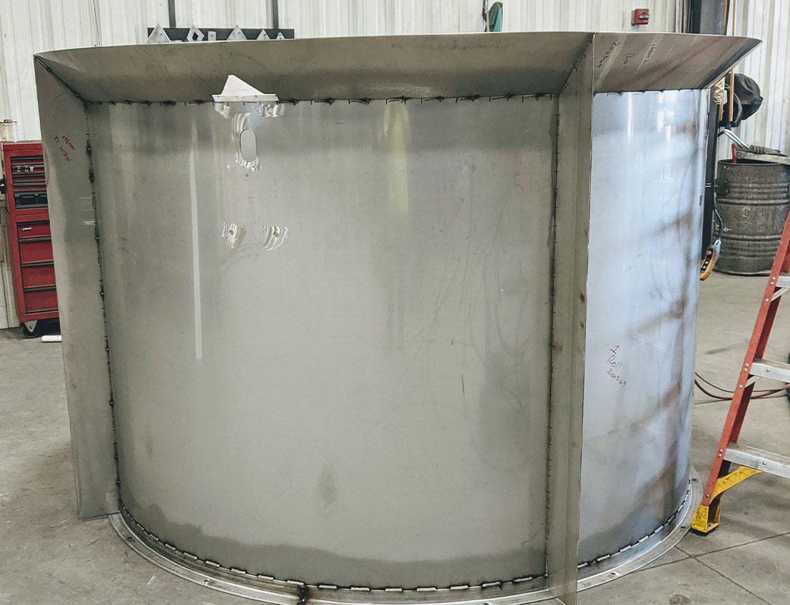 Tank, chutes, hoppers, and other customized stainless steel sheet metal constructions are no problem for SWF. Welding such as MIG (shown) and TIG, and engineering features