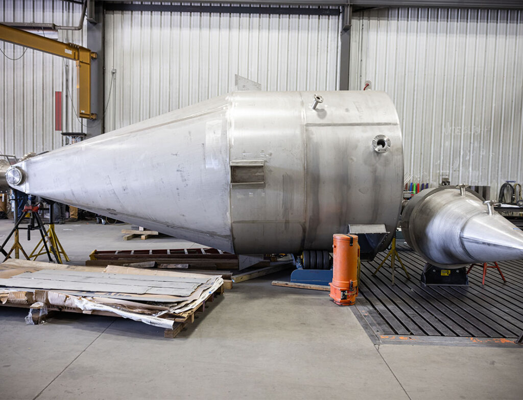 Stainless steel cyclones with 2B exterior finish on the factory floor waiting for finishing