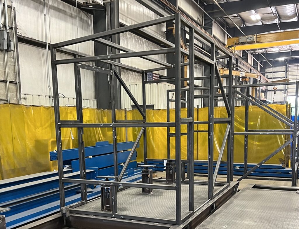 metal skid frame shown prior to enclosure with Ibeam construction not pictured