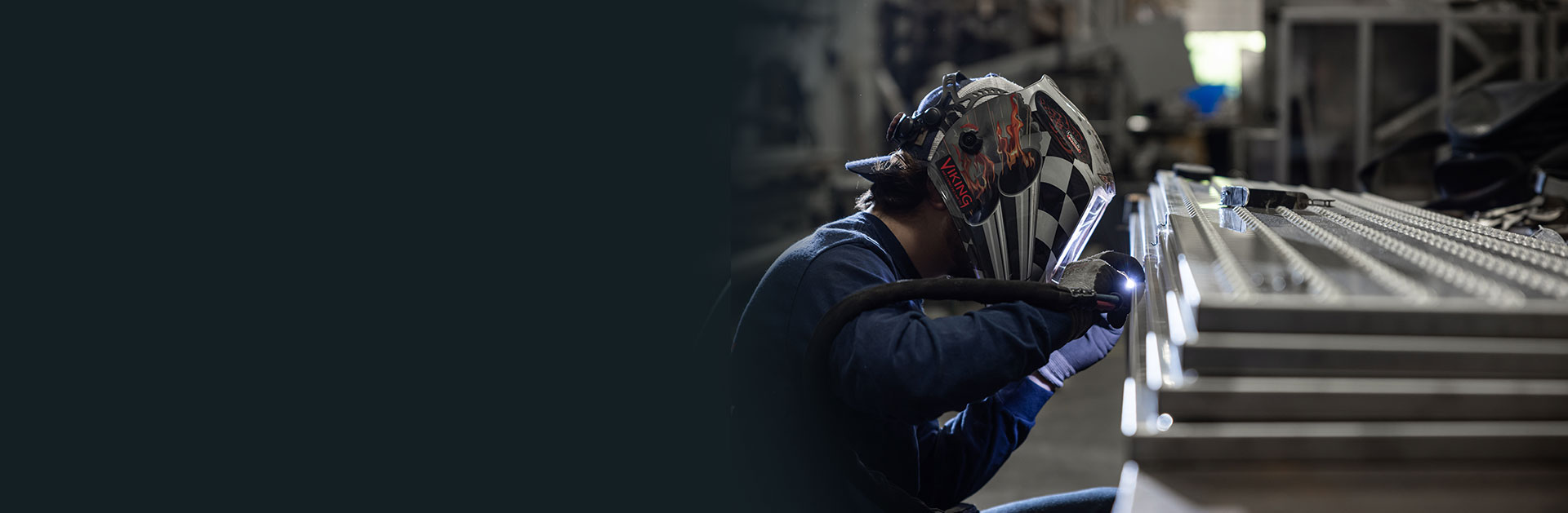 A welder works on steel at SWF Industrial in PA