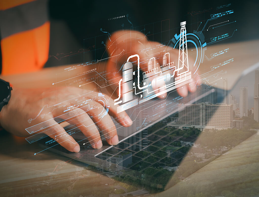 An overview of a powerplant schematic superimposed over the hands of someone who is working on a laptop.