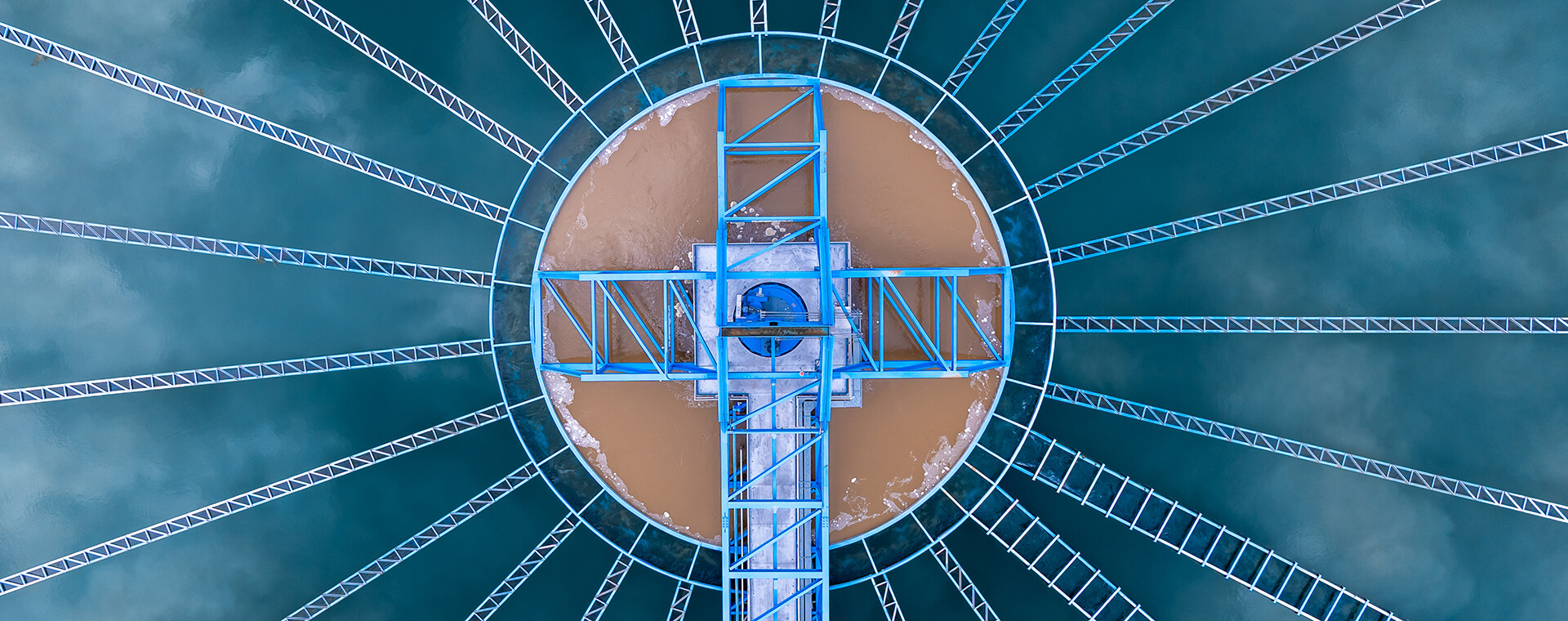 Wastewater plant areal view showing stainless steel infrastructure.