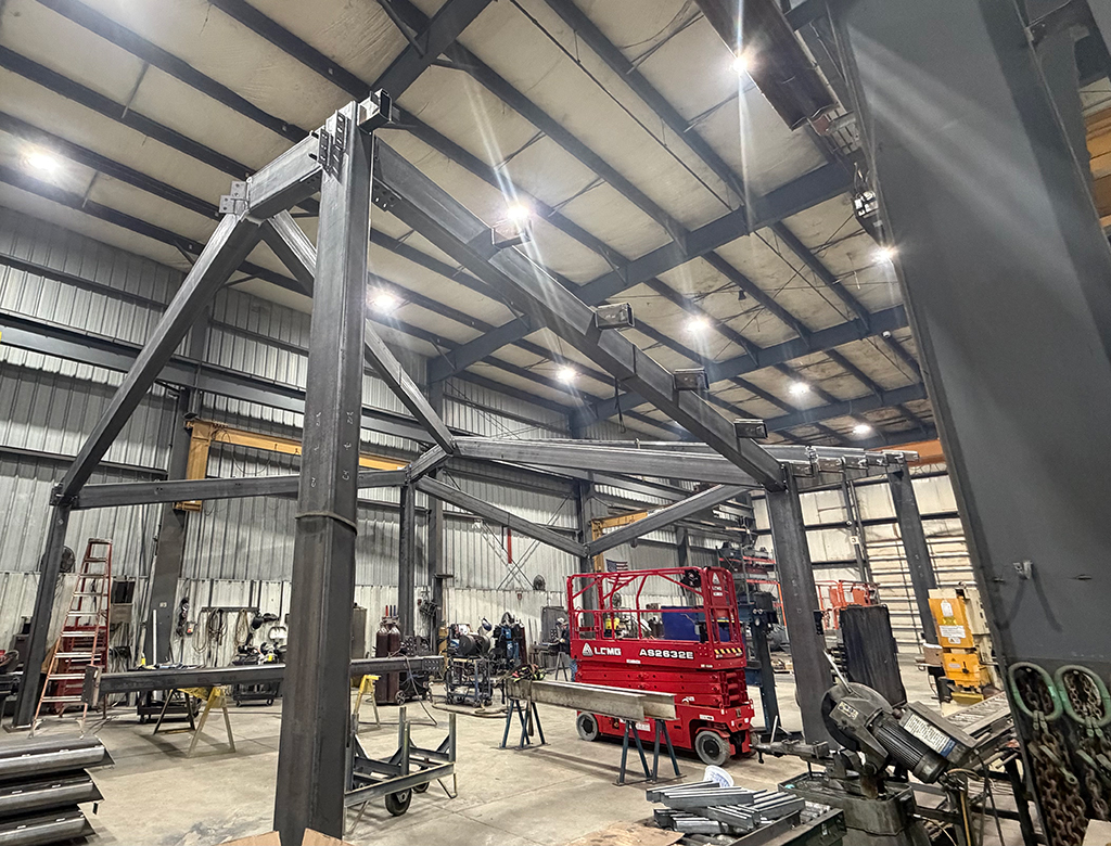 Image shows the height and complexity of this canopy build in SWF's spacious shop.